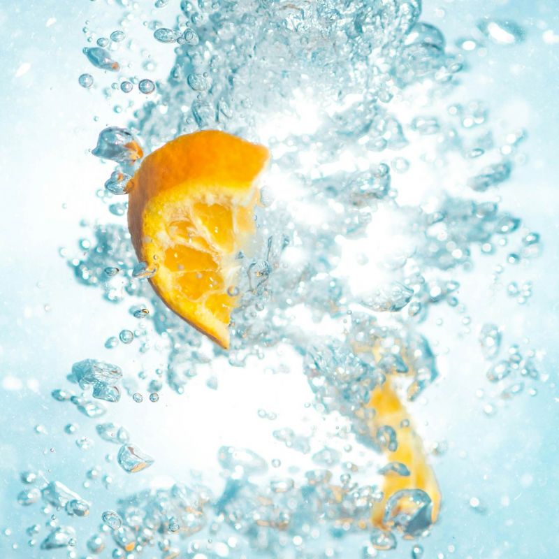 an image of citrus and liquids to represent immunity and health boost