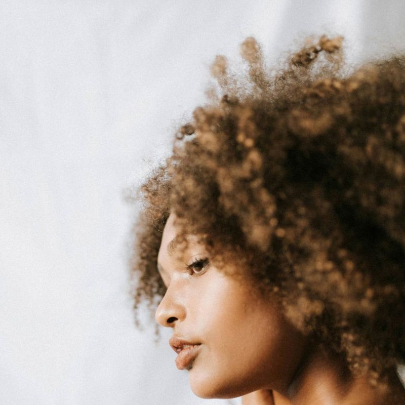 a healthy vibrant woman embodying the natural defense IV treatment