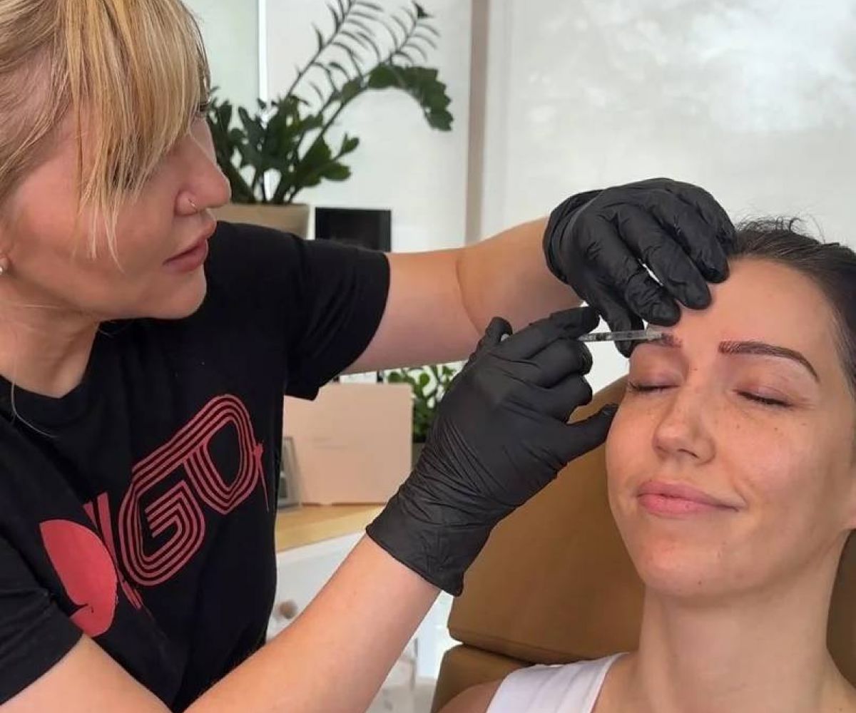 Nurse injector preparing a syringe at Savage Serenity MedSpa in Fresno